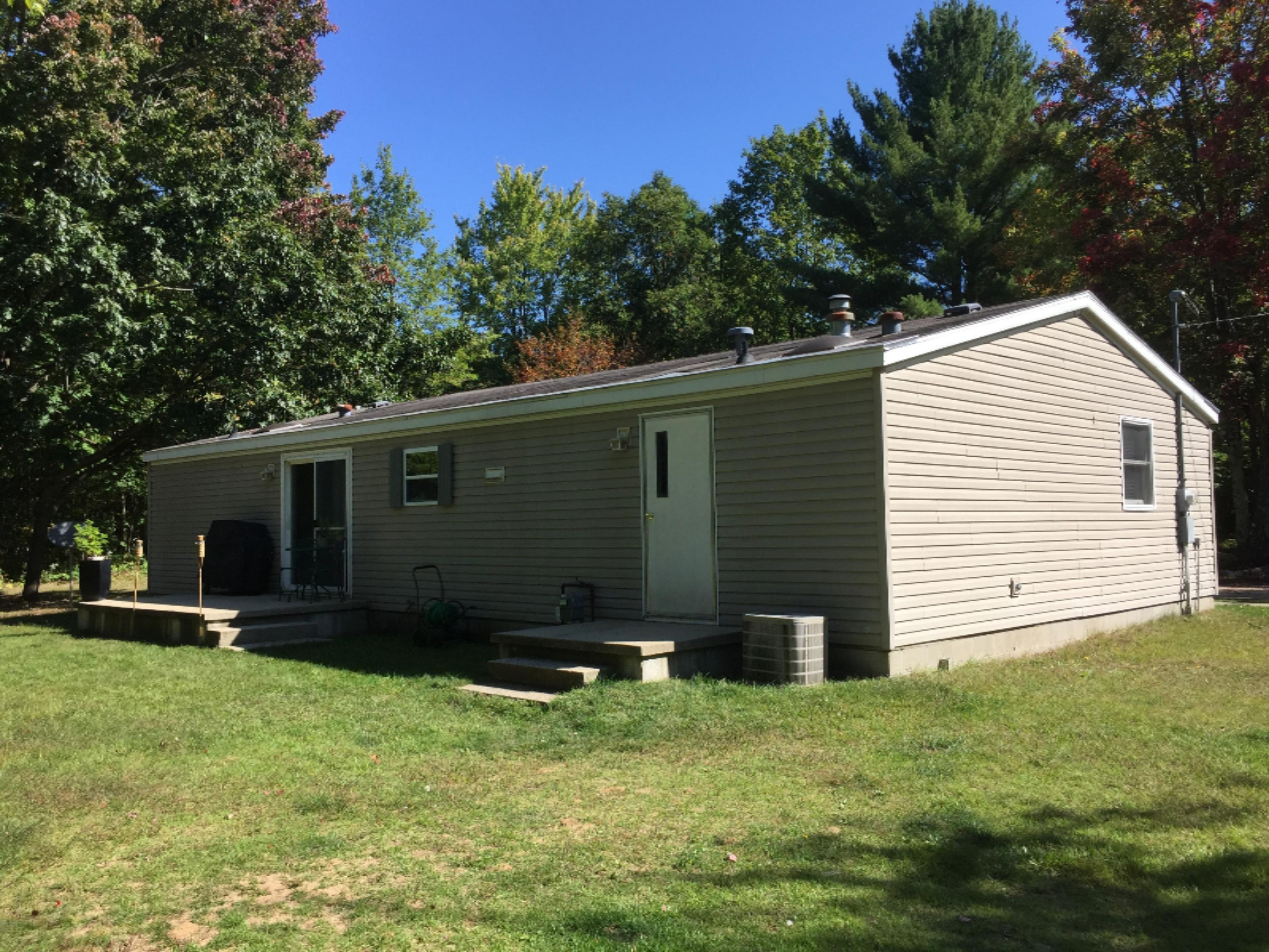 7040 North High Bridge Road Kaleva, MI 49645 - Photo 22 of 50 Two Cement Patios