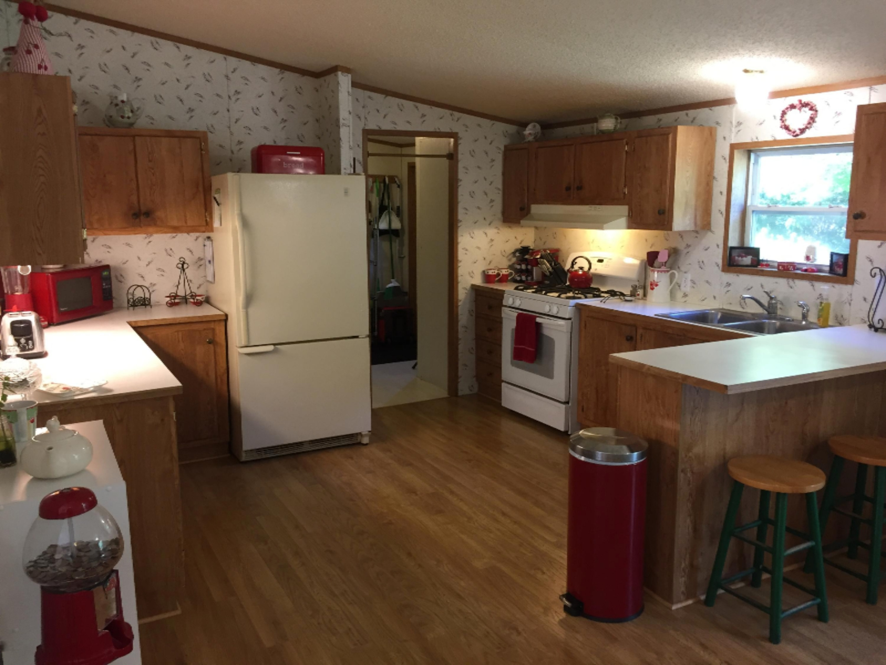 7040 North High Bridge Road Kaleva, MI 49645 - Photo 32 of 50 Kitchen with Snack Bar