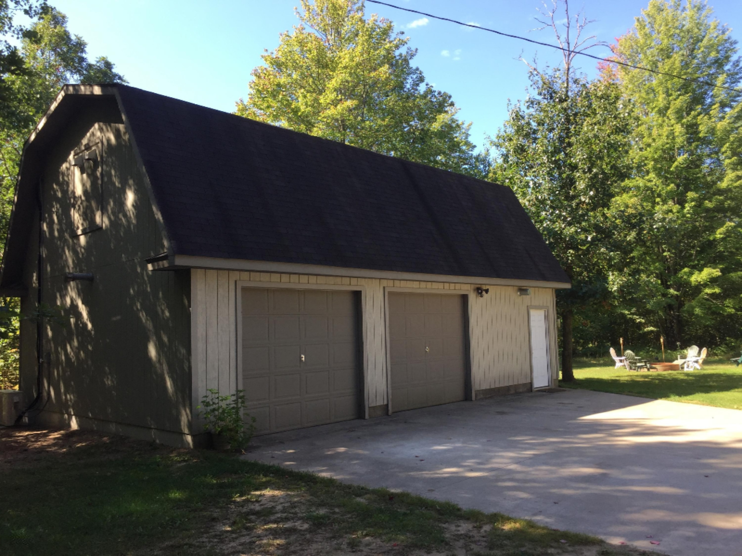 7040 North High Bridge Road Kaleva, MI 49645 - Photo 6 of 50 Sensor Light on Exterior