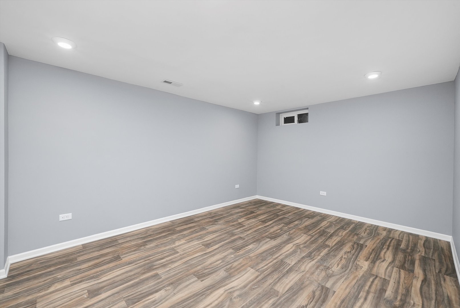 224 South State Street Lockport, IL 60441 - Photo 14 of 28 a view of room with wooden floor and fan