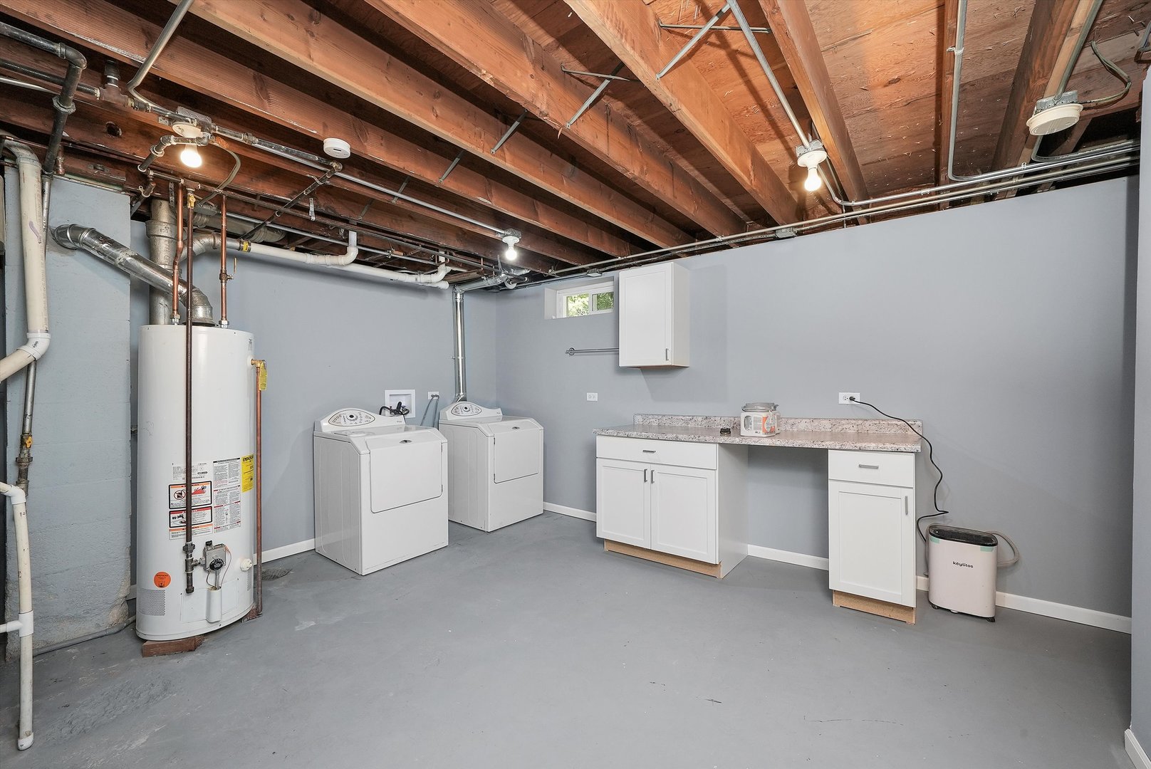 224 South State Street Lockport, IL 60441 - Photo 16 of 28 a utility room with cabinets