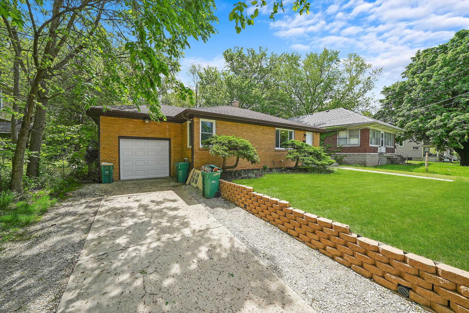 224 South State Street Lockport, IL 60441 - Photo 17 of 28 a front view of a house with garden