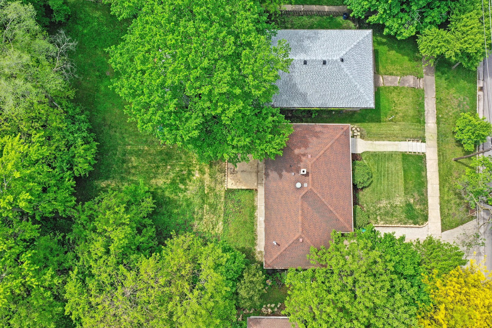 224 South State Street Lockport, IL 60441 - Photo 22 of 28 an aerial view of a house with a yard and a large tree