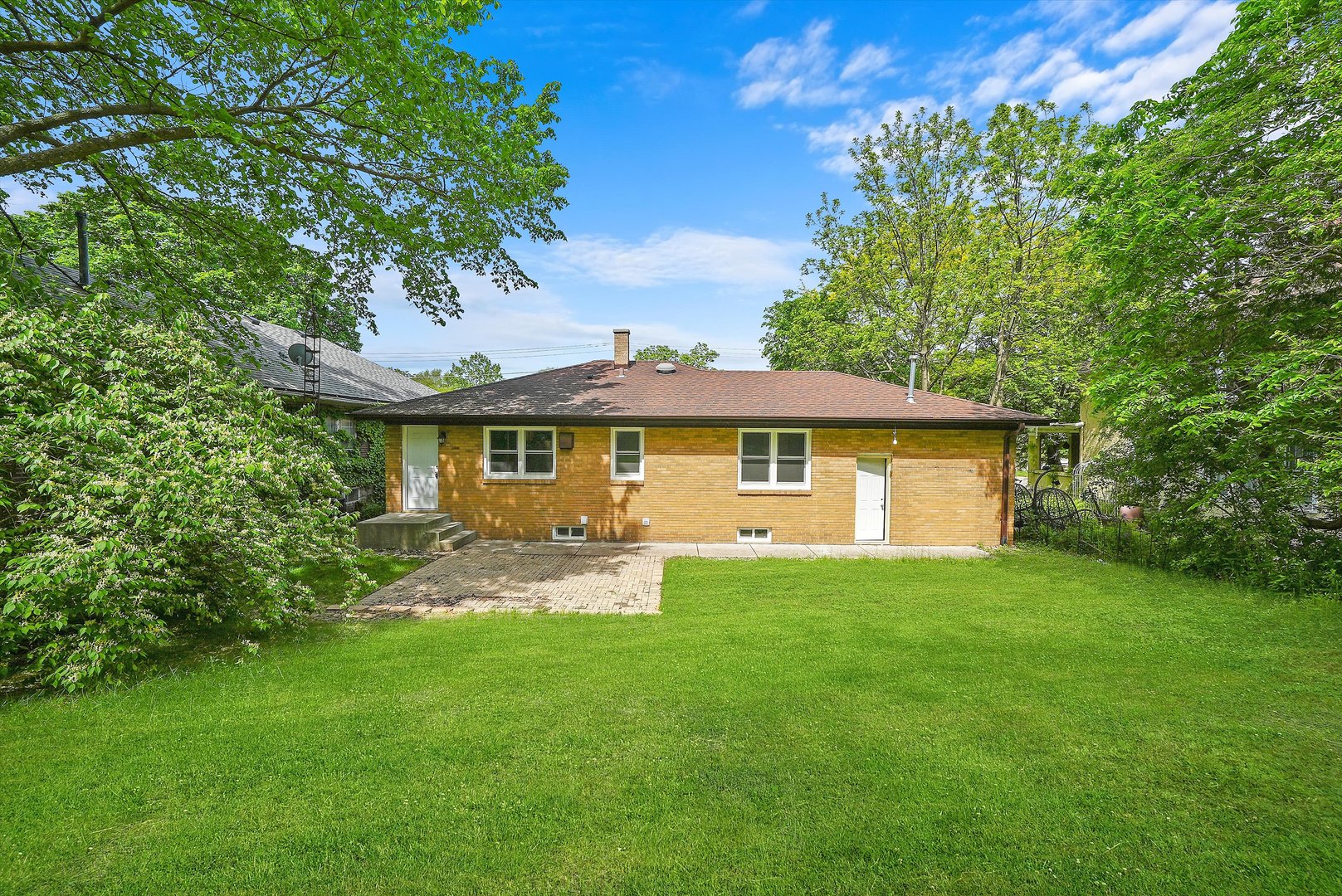 224 South State Street Lockport, IL 60441 - Photo 25 of 28 a front view of a house with a garden
