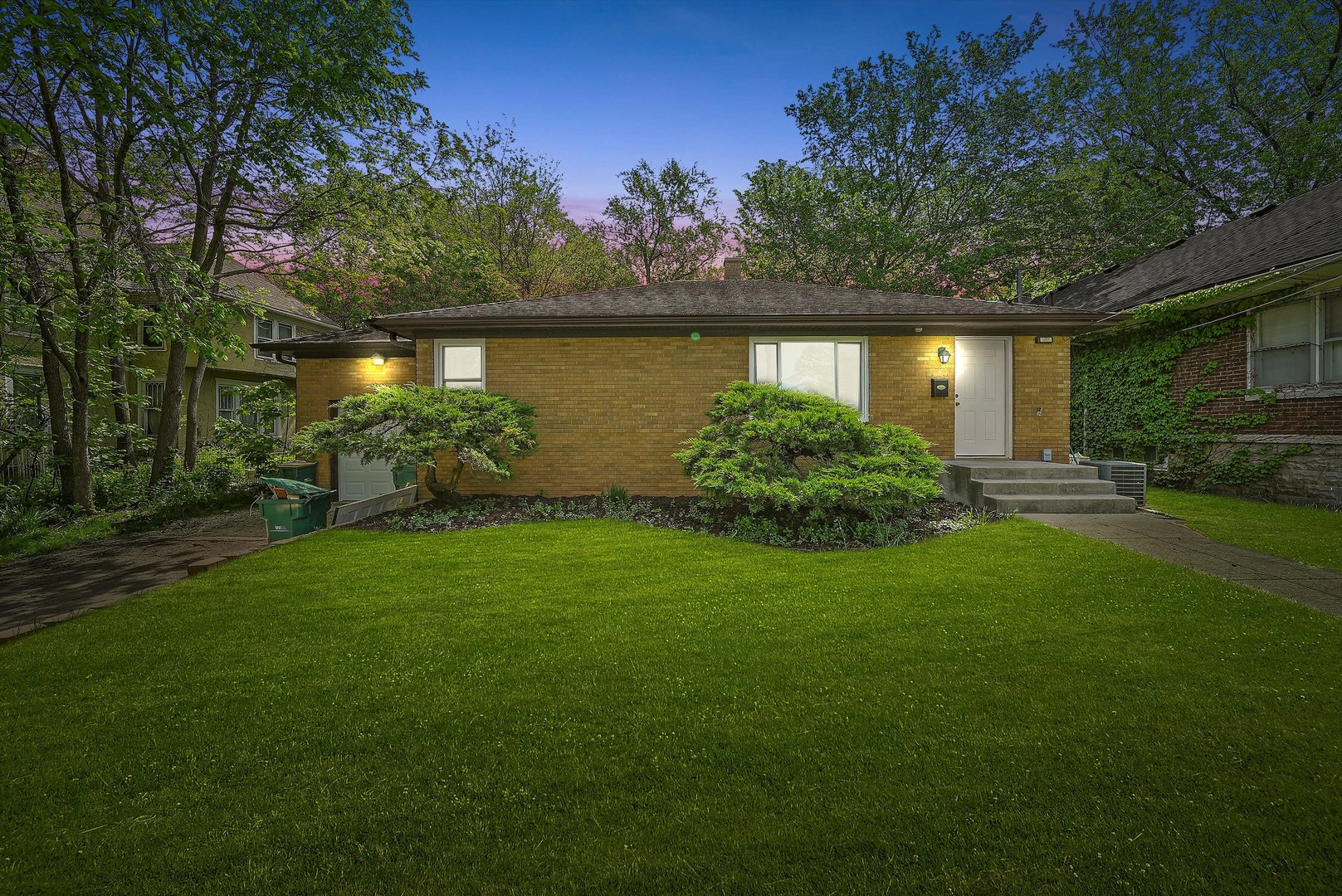 224 South State Street Lockport, IL 60441 - Photo 26 of 28 a view of a garden with a fountain