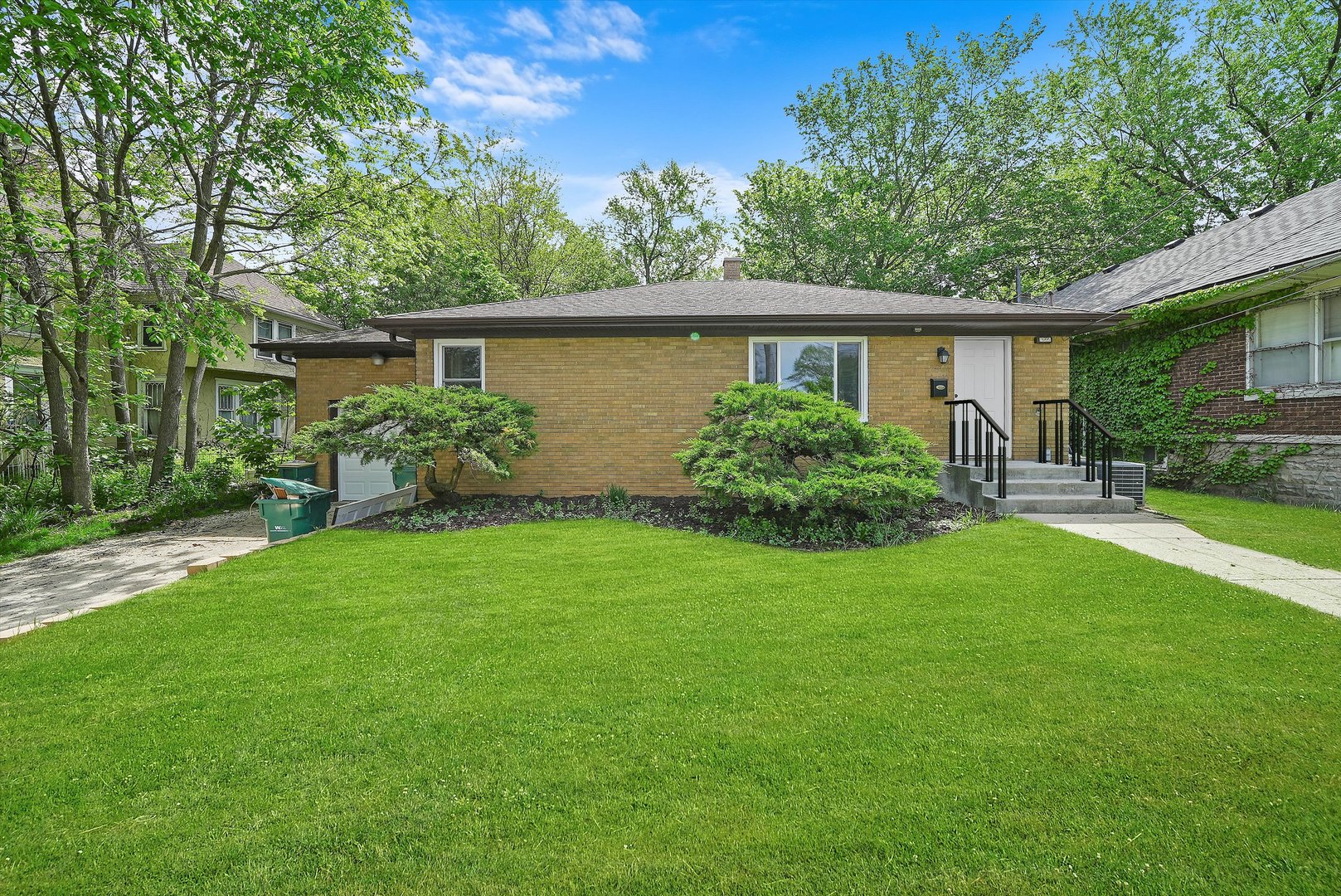 224 South State Street Lockport, IL 60441 - Photo 28 of 28 a front view of a house with garden