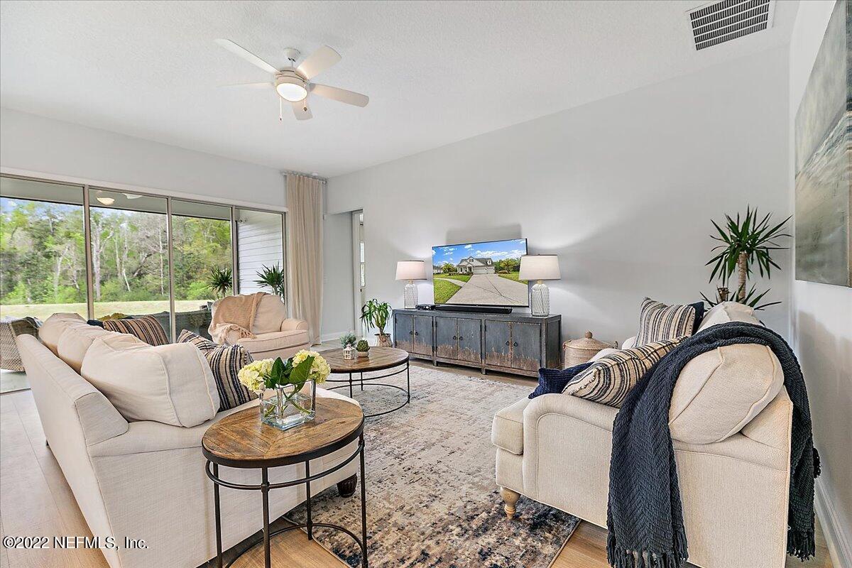 27 Red Twig Way St. Augustine, FL 32092 - Photo 11 of 47 a living room with furniture and a large window