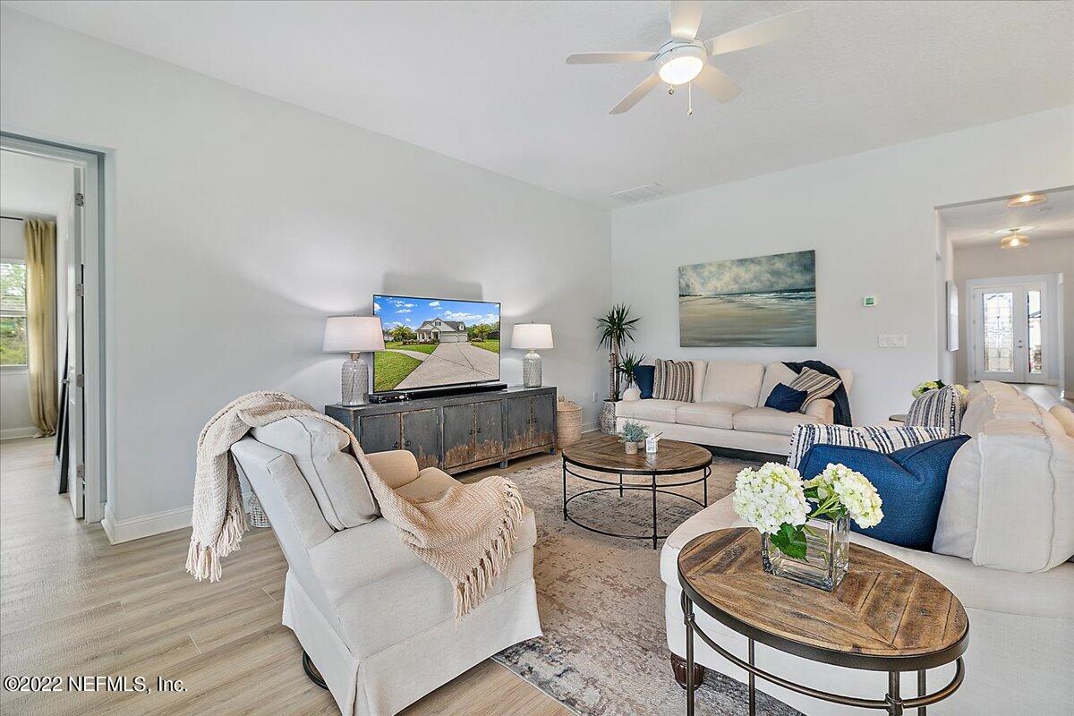 27 Red Twig Way St. Augustine, FL 32092 - Photo 12 of 47 a living room with furniture and a wooden floor