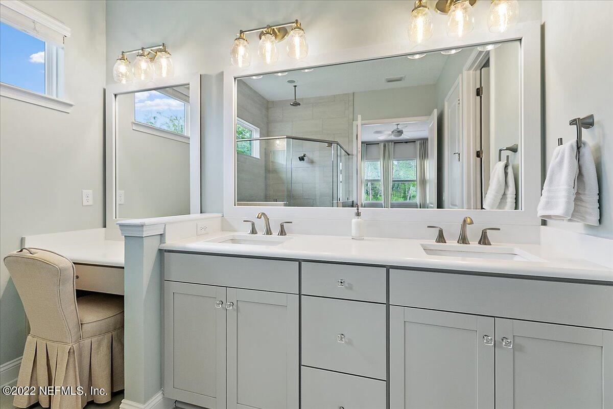 27 Red Twig Way St. Augustine, FL 32092 - Photo 16 of 47 a bathroom with a double vanity sink mirror and