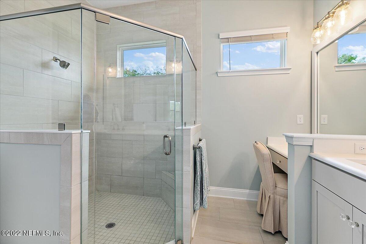 27 Red Twig Way St. Augustine, FL 32092 - Photo 17 of 47 a bathroom with a shower and a sink