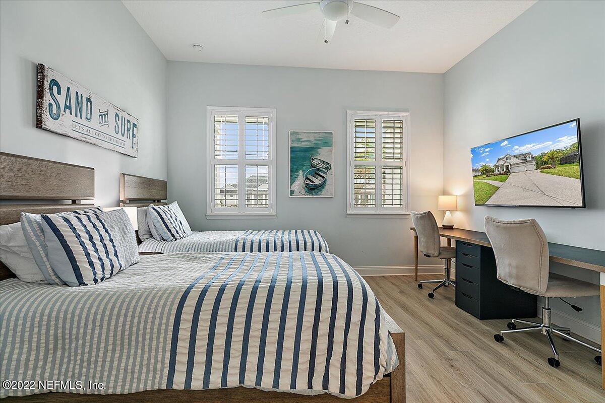 27 Red Twig Way St. Augustine, FL 32092 - Photo 20 of 47 a bedroom with a bed and a desk