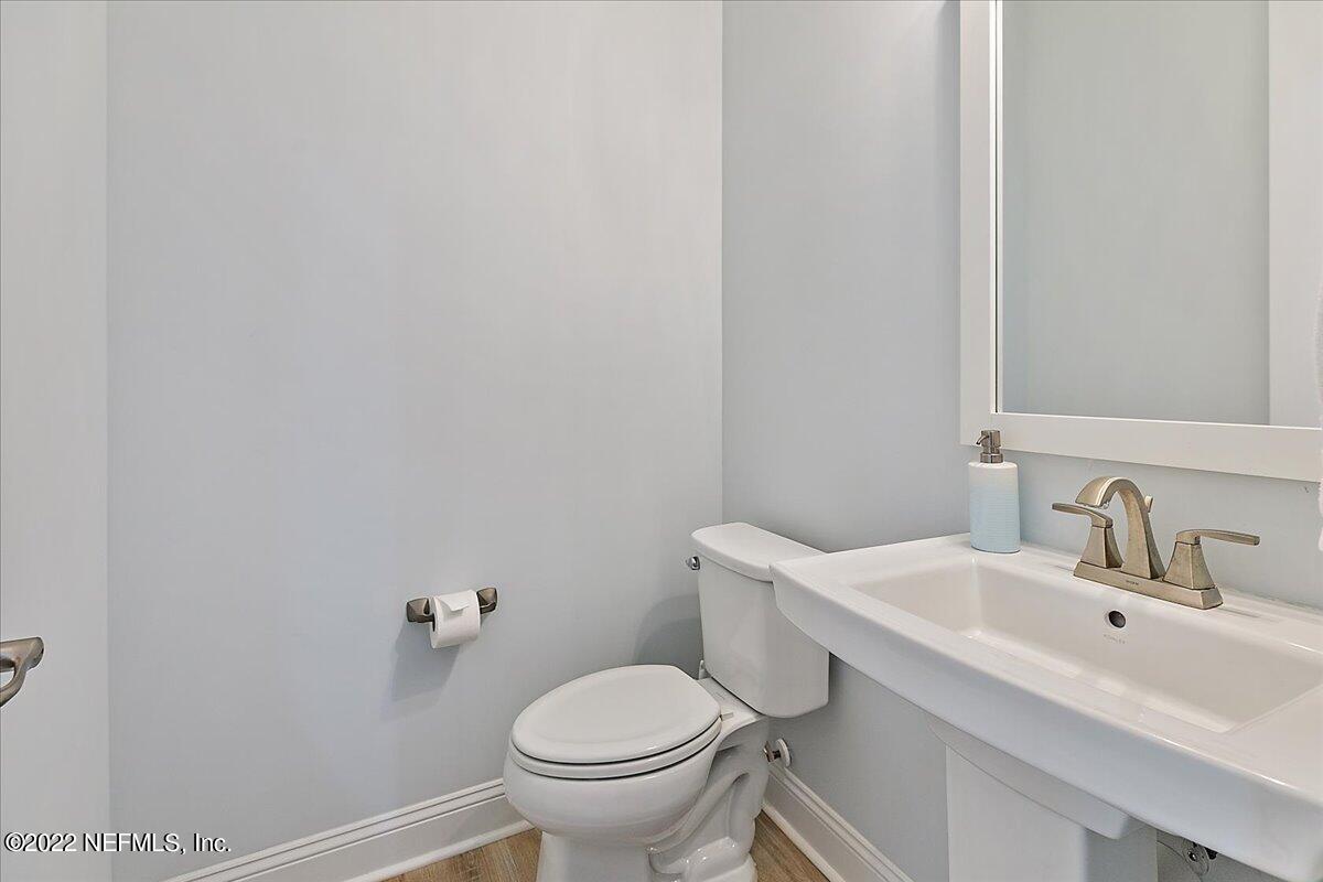27 Red Twig Way St. Augustine, FL 32092 - Photo 23 of 47 a bathroom with a sink toilet and mirror