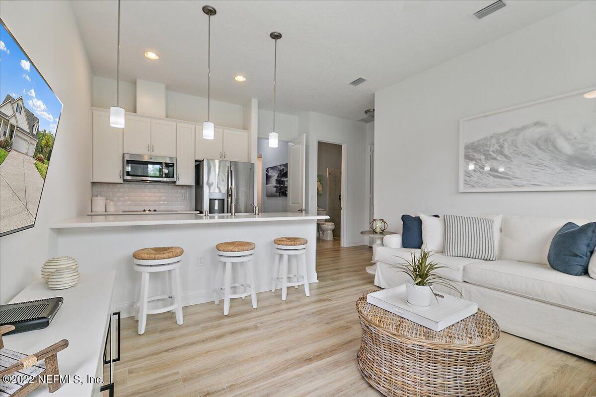 27 Red Twig Way St. Augustine, FL 32092 - Photo 26 of 47 a living room with furniture and a wooden floor