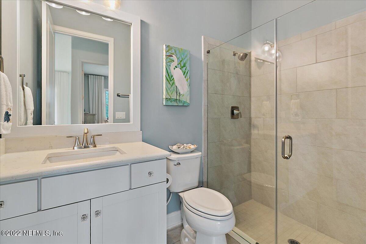 27 Red Twig Way St. Augustine, FL 32092 - Photo 31 of 47 a bathroom with a sink toilet and shower