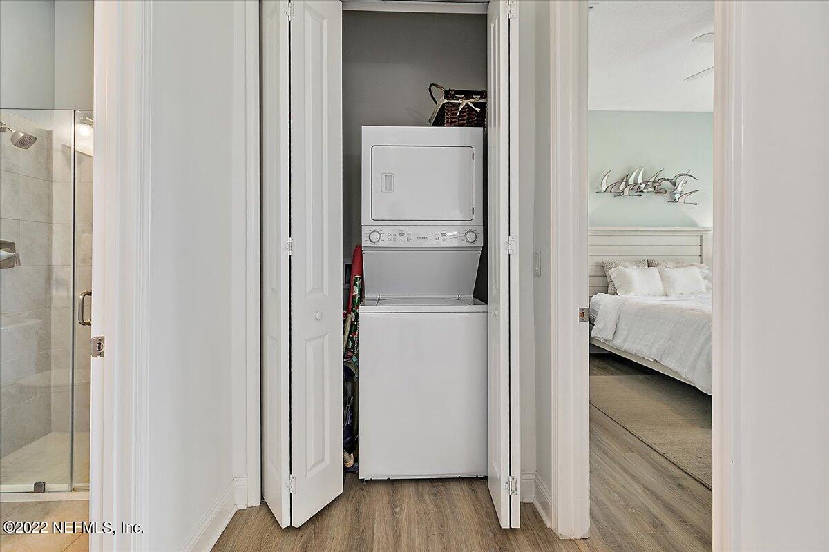 27 Red Twig Way St. Augustine, FL 32092 - Photo 32 of 47 a walk in closet with wooden floor