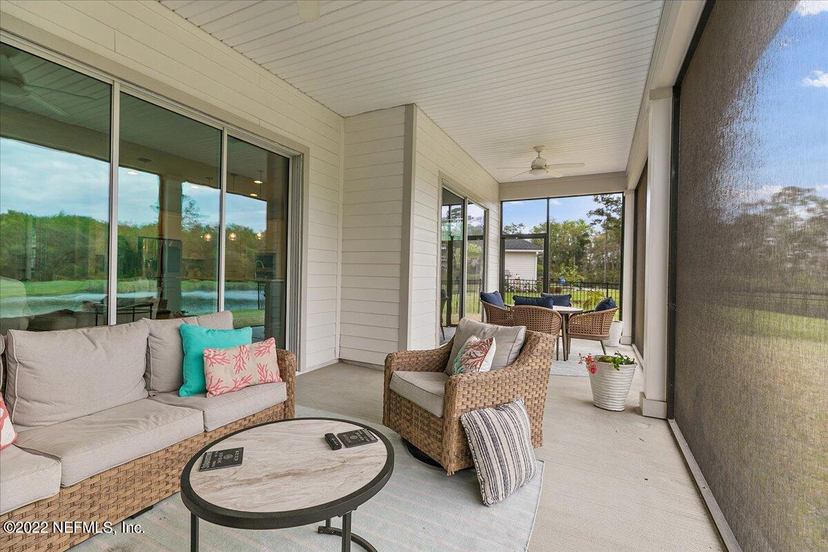 27 Red Twig Way St. Augustine, FL 32092 - Photo 34 of 47 a living room with furniture and a large window