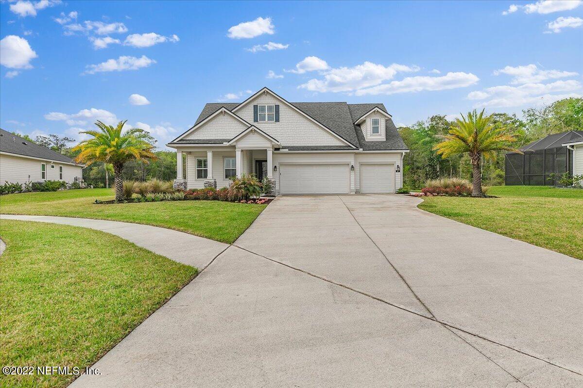 27 Red Twig Way St. Augustine, FL 32092 - Photo 39 of 47 a front view of a house with garden