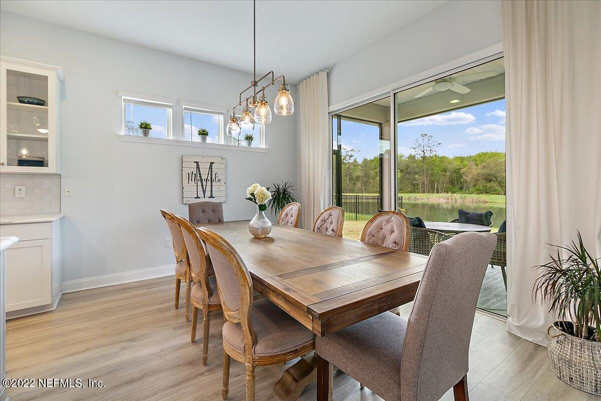 27 Red Twig Way St. Augustine, FL 32092 - Photo 7 of 47 a view of a dining room with furniture window and outside view