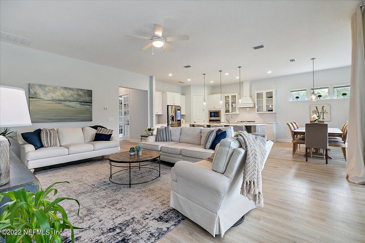 27 Red Twig Way St. Augustine, FL 32092 - Photo 10 of 47 a living room with furniture and a view of kitchen