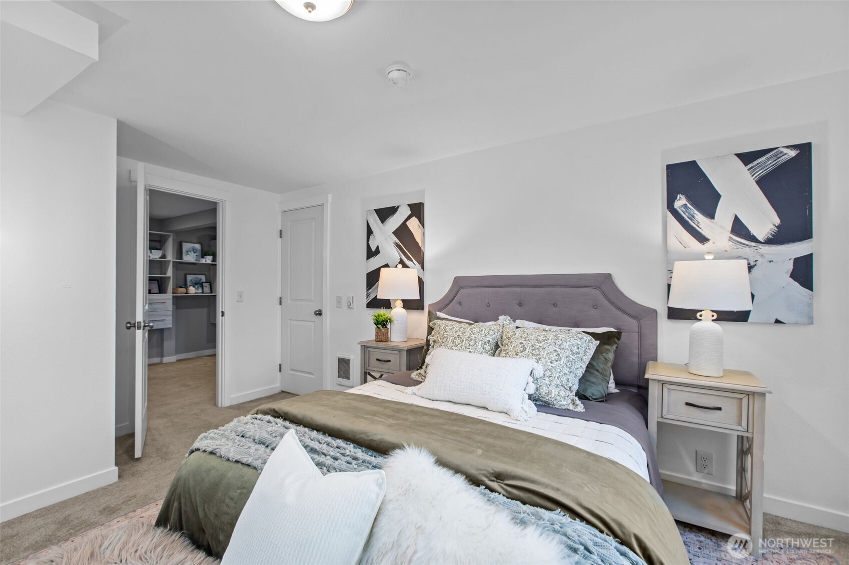 2018 Northeast 97th Street Seattle, WA 98115 - Photo 20 of 39 a bedroom with a bed and a closet