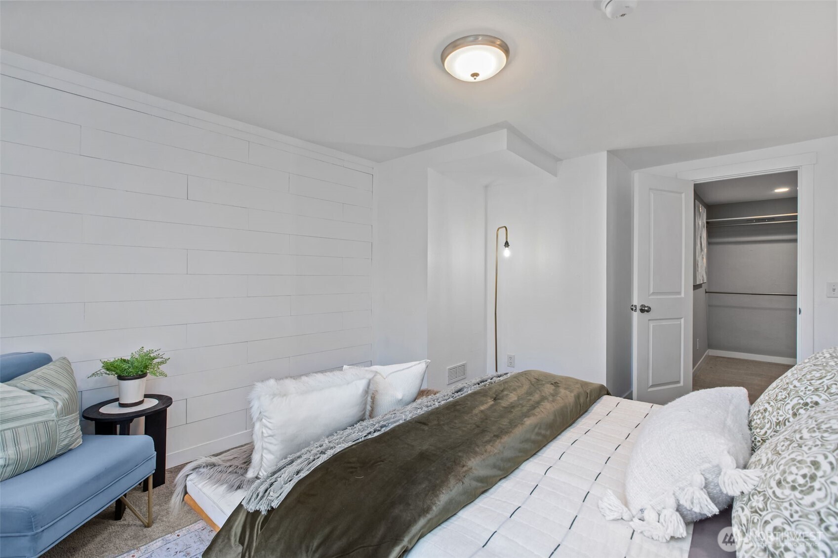 2018 Northeast 97th Street Seattle, WA 98115 - Photo 21 of 39 a bedroom with a bed and a couch