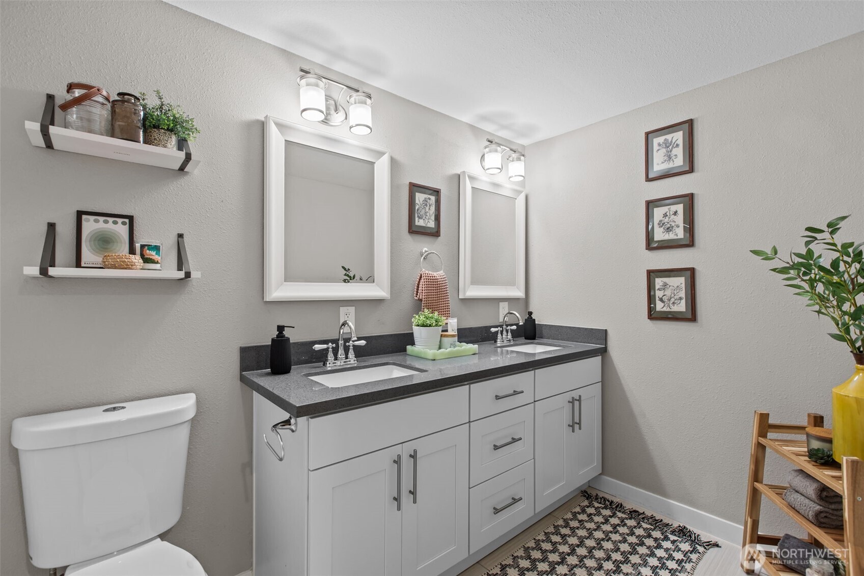 2018 Northeast 97th Street Seattle, WA 98115 - Photo 22 of 39 a bathroom with a toilet sink and mirror
