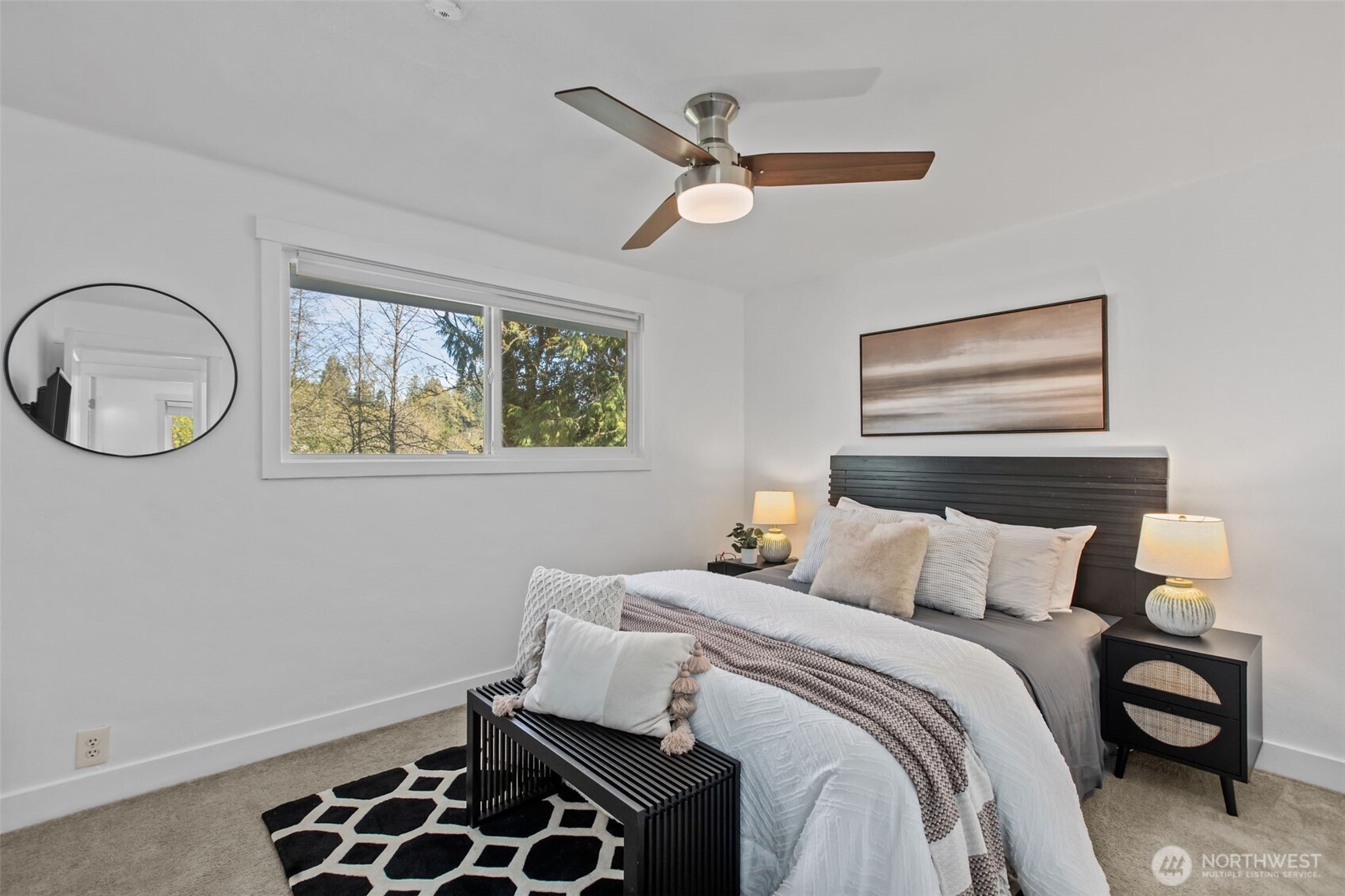 2018 Northeast 97th Street Seattle, WA 98115 - Photo 26 of 39 a bedroom with a bed and a painting on the wall