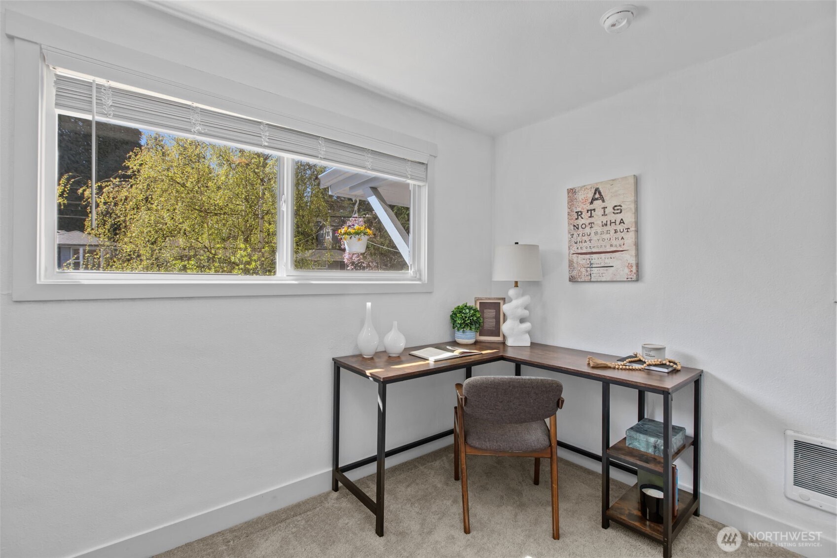 2018 Northeast 97th Street Seattle, WA 98115 - Photo 31 of 39 a view of a workspace with furniture and a window