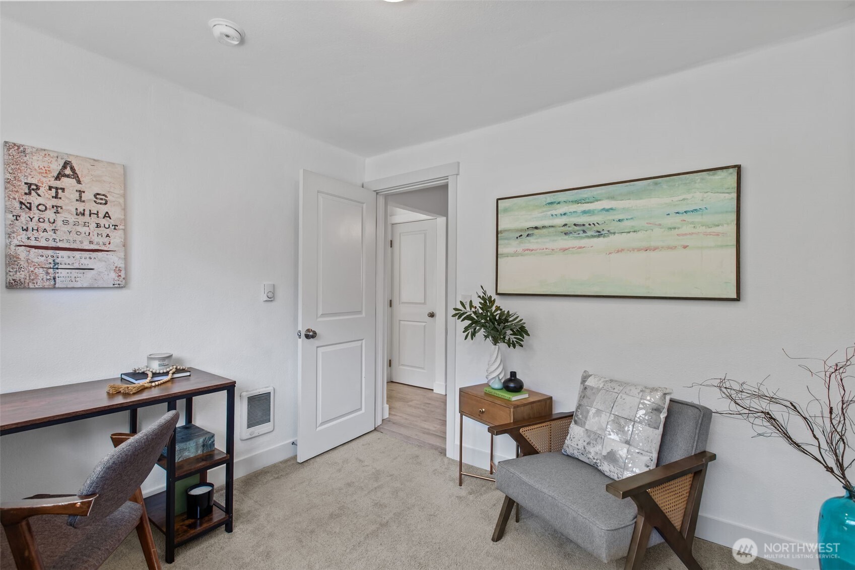 2018 Northeast 97th Street Seattle, WA 98115 - Photo 32 of 39 a room with furniture and a potted plant