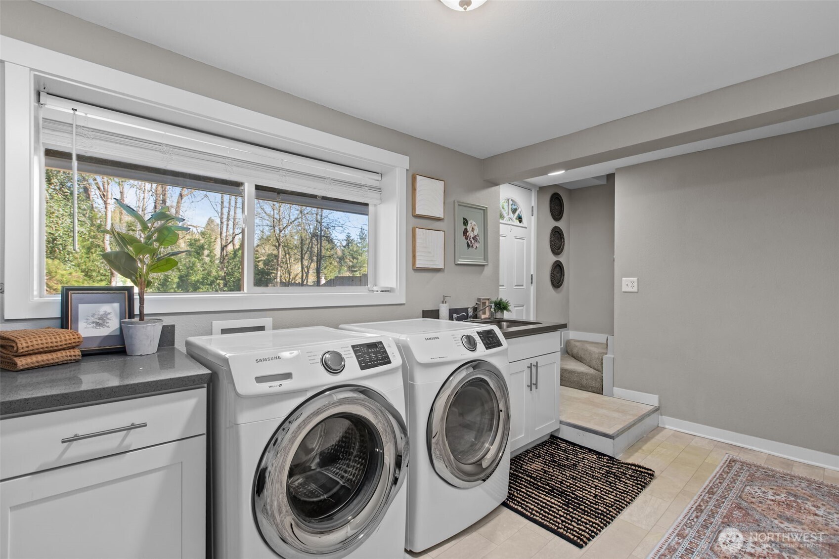 2018 Northeast 97th Street Seattle, WA 98115 - Photo 33 of 39 a view of a storage & utility room with washer and dryer