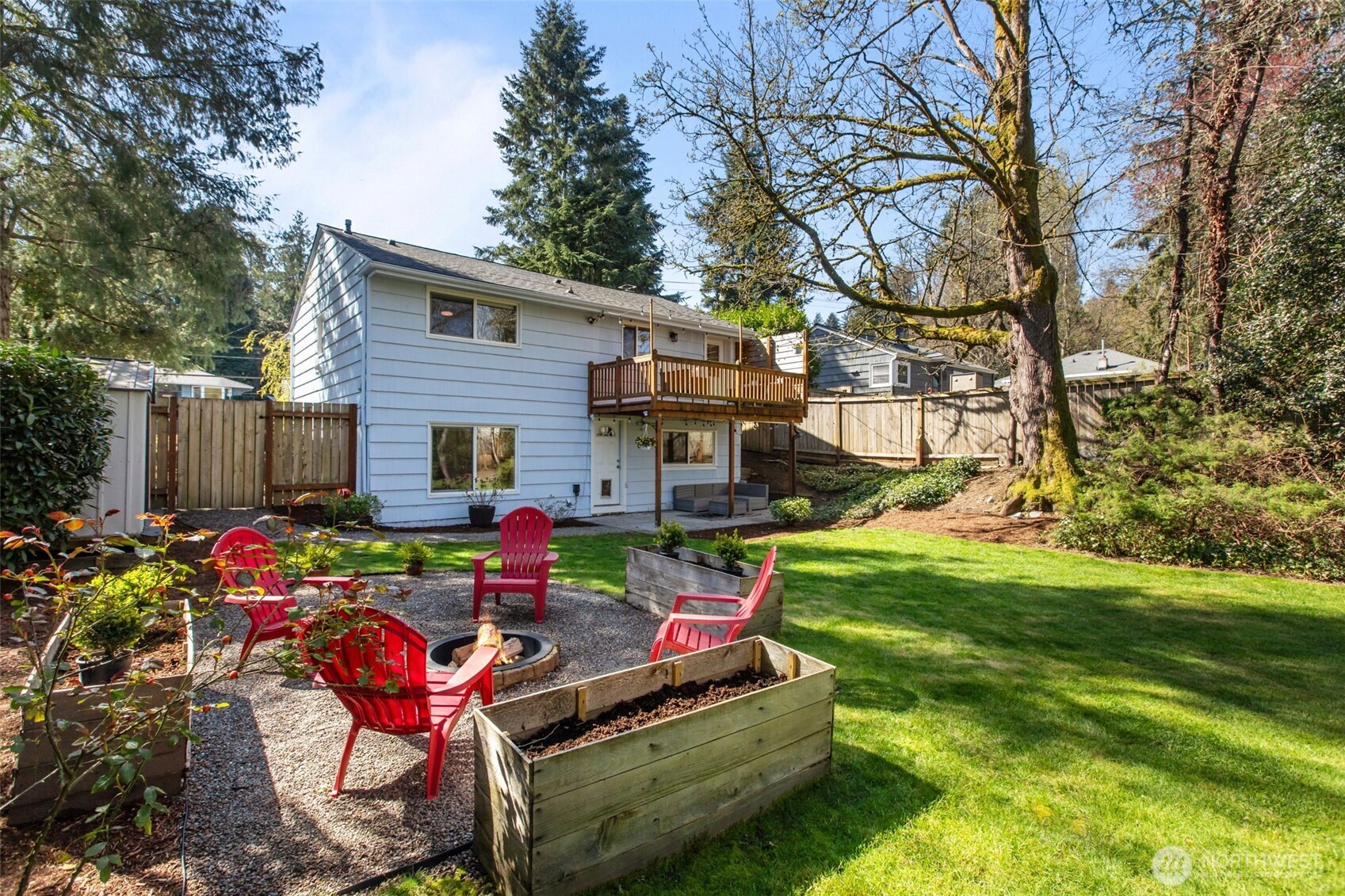 2018 Northeast 97th Street Seattle, WA 98115 - Photo 35 of 39 a backyard of a house with barbeque oven table and chairs