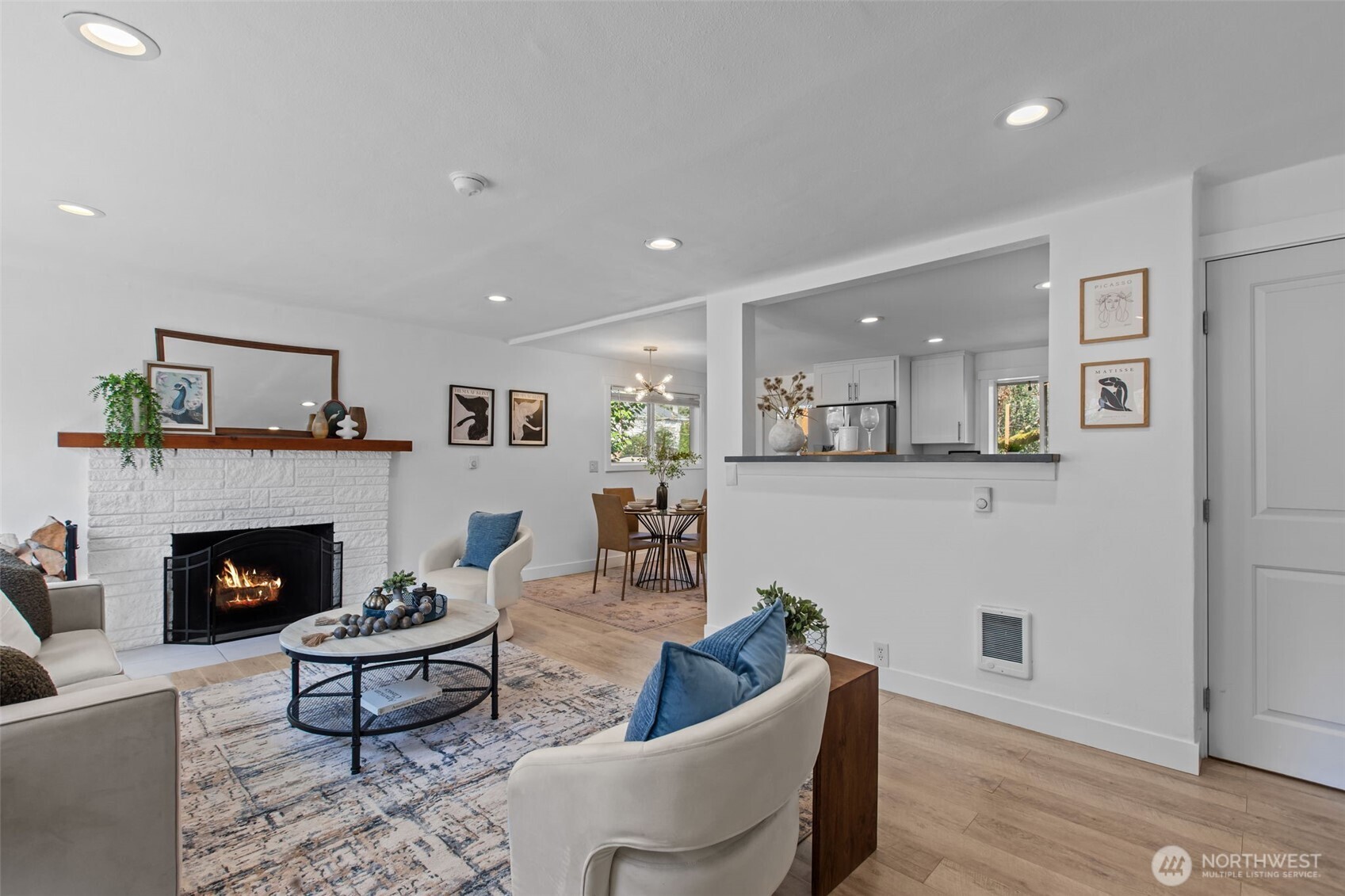 2018 Northeast 97th Street Seattle, WA 98115 - Photo 5 of 39 a living room with furniture and a fireplace