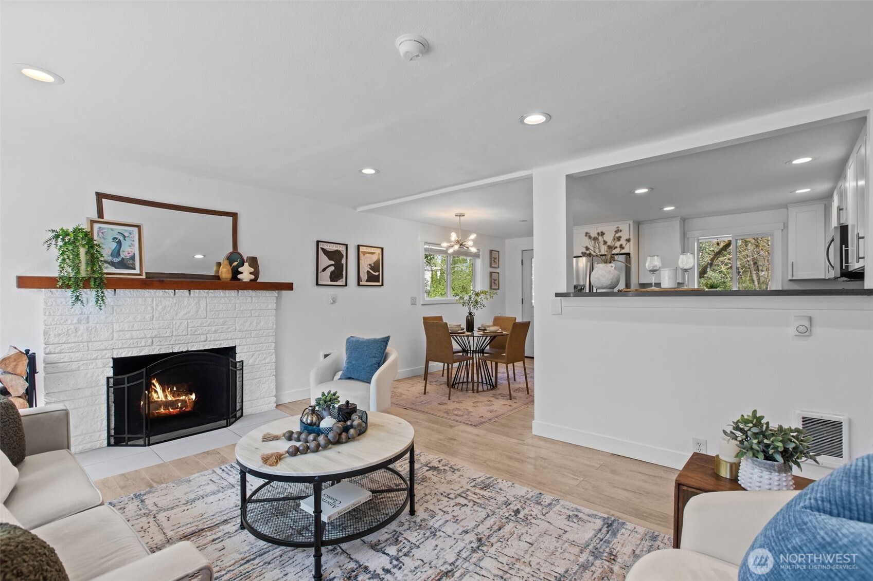 2018 Northeast 97th Street Seattle, WA 98115 - Photo 6 of 39 a living room with furniture and a fireplace