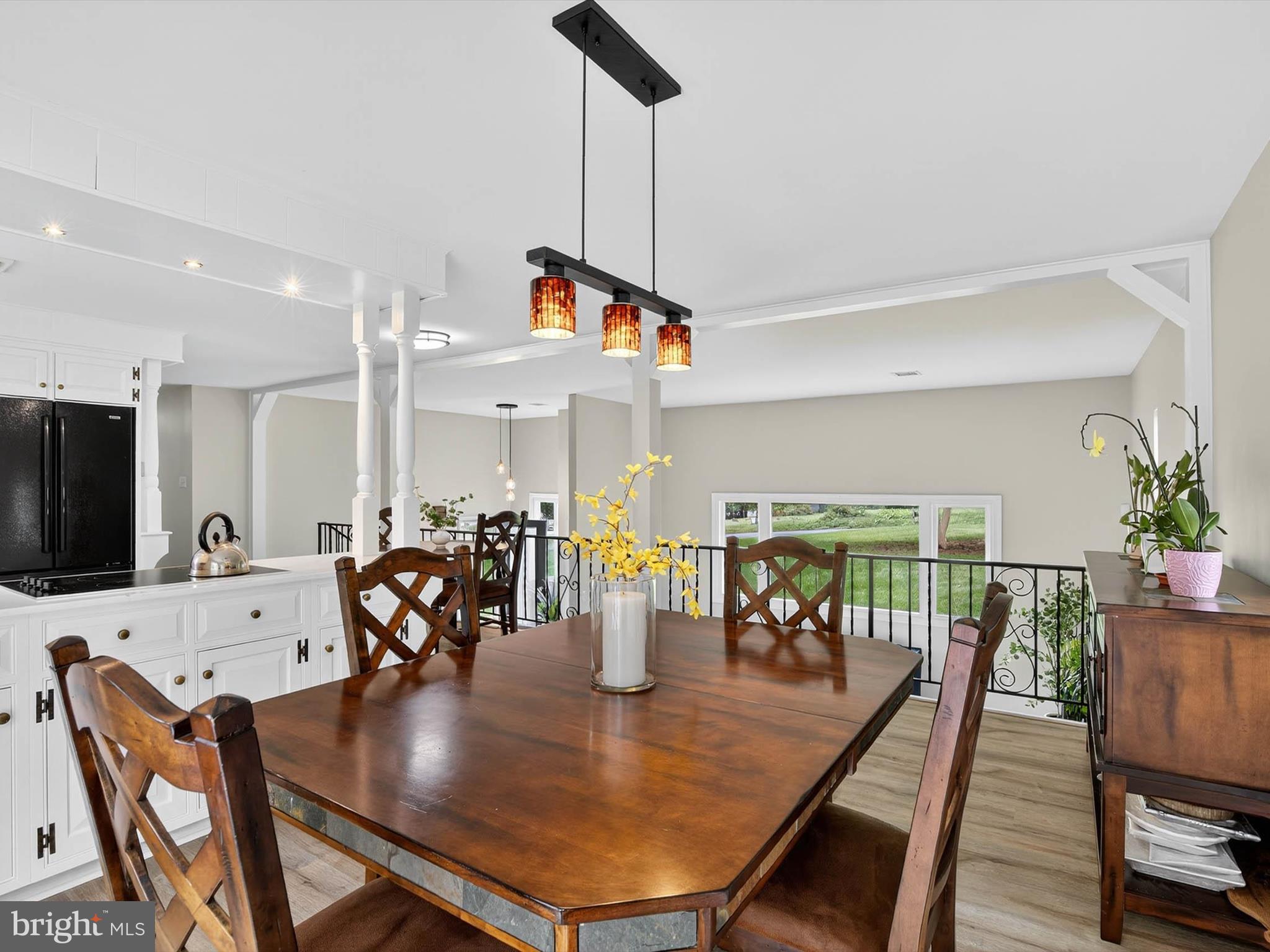 2010 Landis Valley Road Lancaster, PA 17601 - Photo 23 of 76 a dining room with furniture potted plants and wooden floor