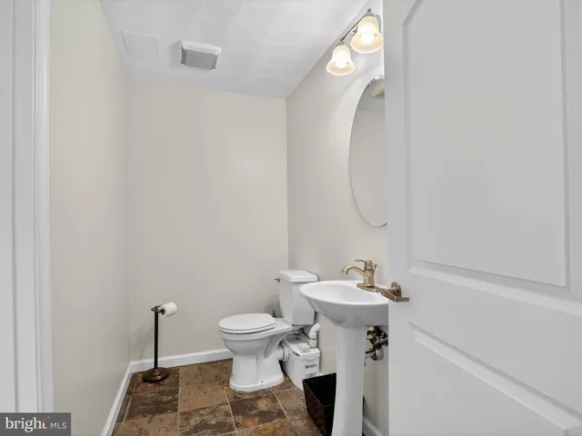 an aerial view of a houses with outdoor space and lake view