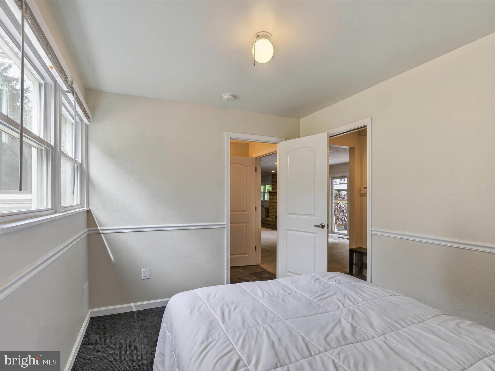 2010 Landis Valley Road Lancaster, PA 17601 - Photo 48 of 76 a bedroom with a bed and a refrigerator