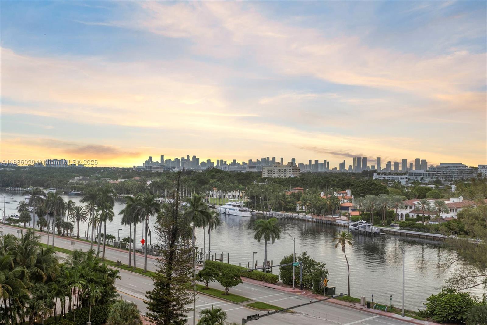 5001 Collins Avenue, Unit 8C Miami Beach, FL 33140 - Photo 18 of 27 a view of a lake and a city