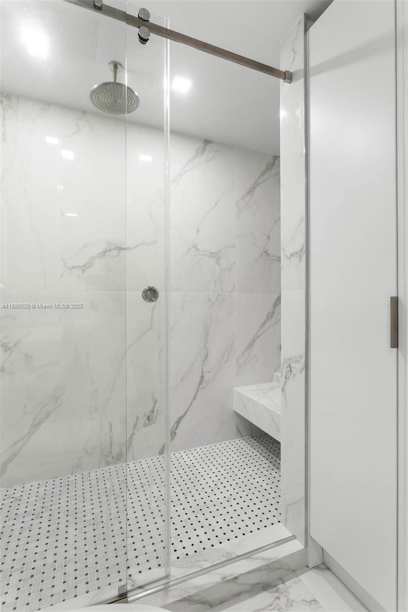 5001 Collins Avenue, Unit 8C Miami Beach, FL 33140 - Photo 20 of 27 a bathroom with a shower