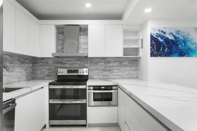 a kitchen with a stove and a sink