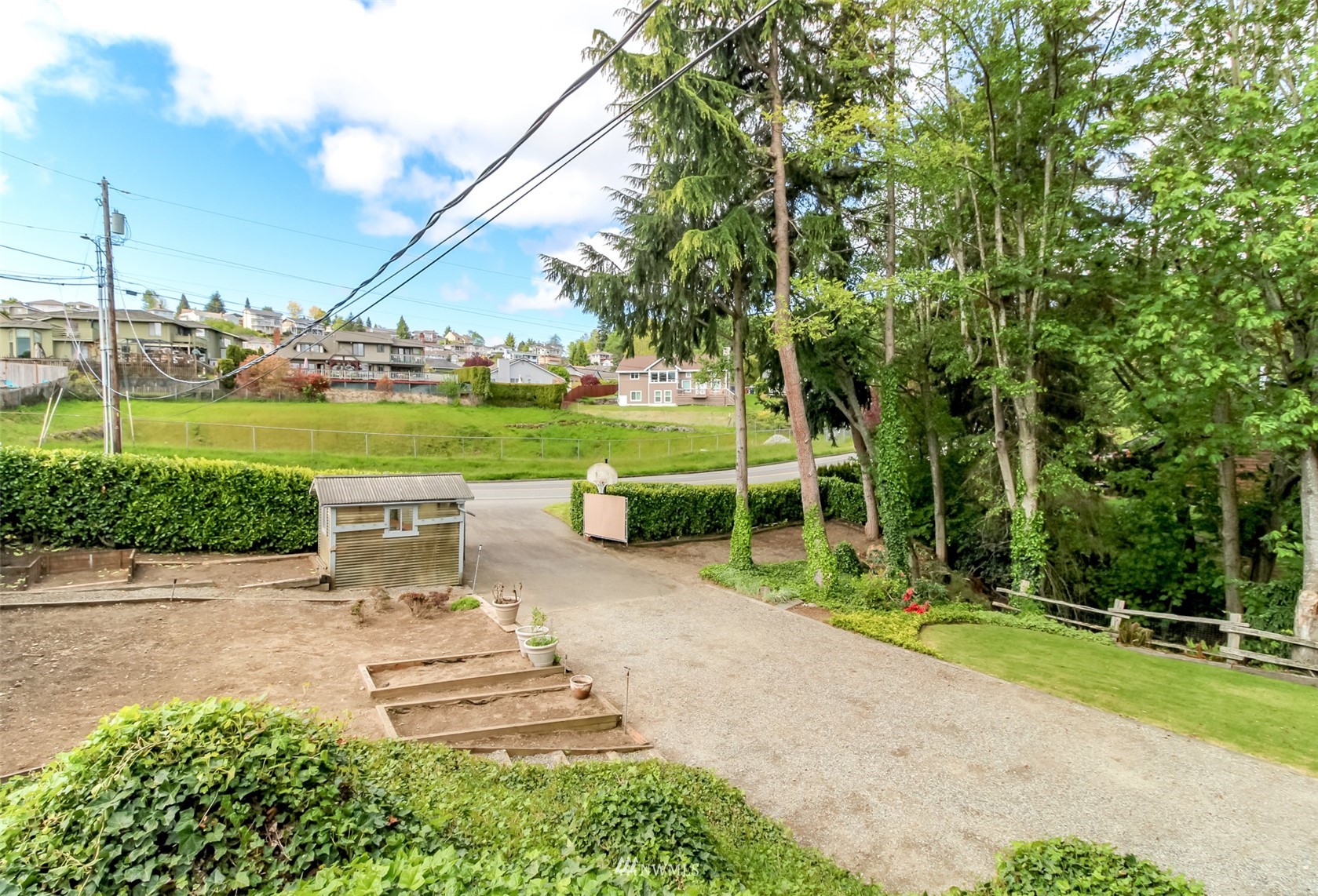 6102 Agnes Road Northeast Tacoma, WA 98422 - Photo 36 of 40 a view of a park with seating space