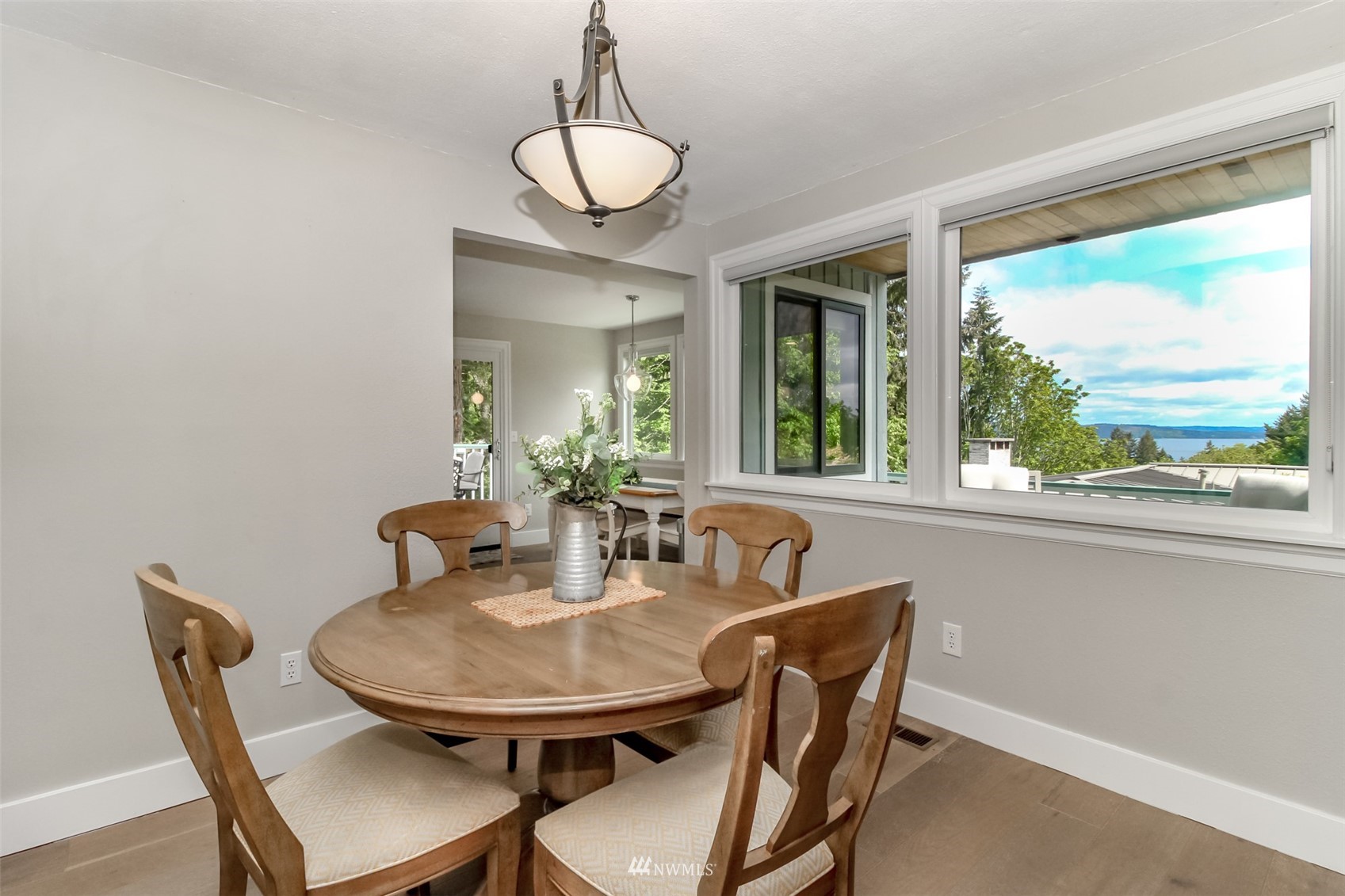 6102 Agnes Road Northeast Tacoma, WA 98422 - Photo 9 of 40 a view of a dining room with furniture window and outside view
