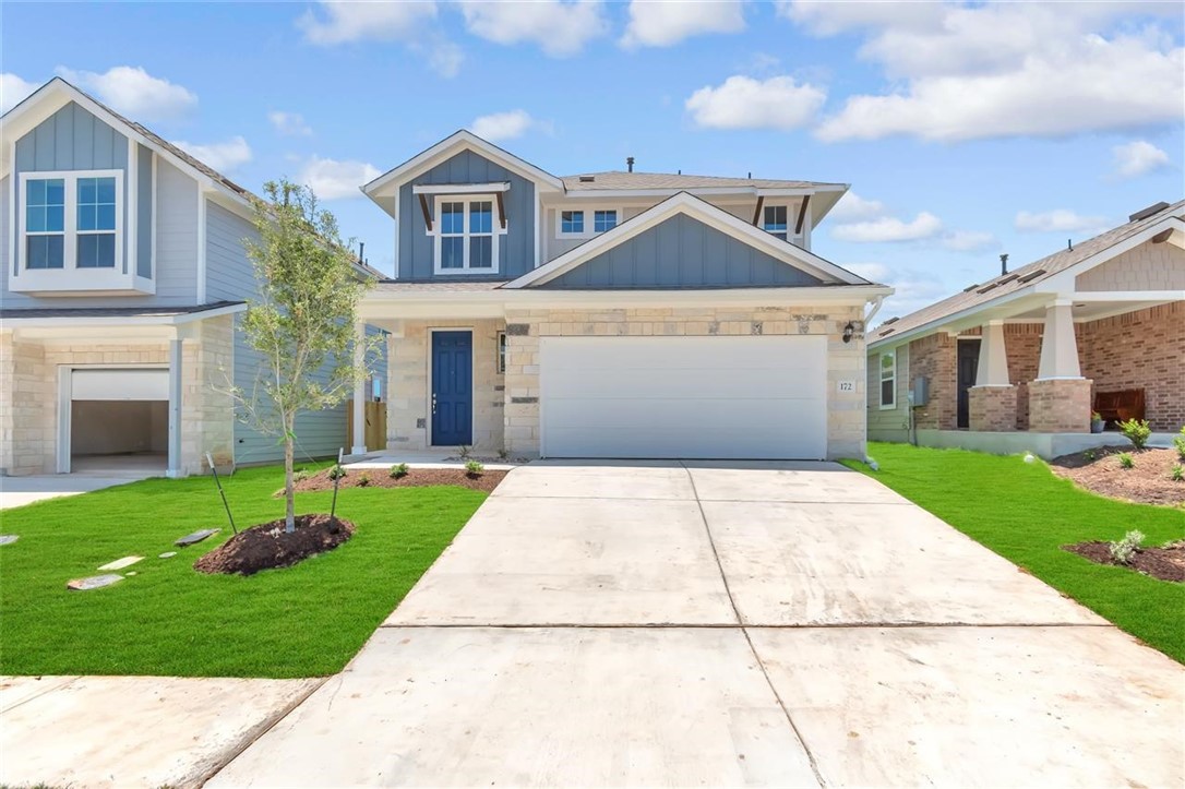 105 Appleberry Lane Elgin, TX 78621 - Photo 1 of 1 a front view of a house with a yard
