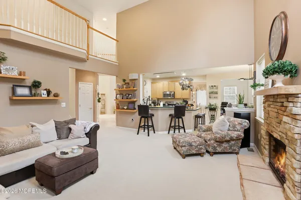 a kitchen with stainless steel appliances granite countertop a stove and a refrigerator