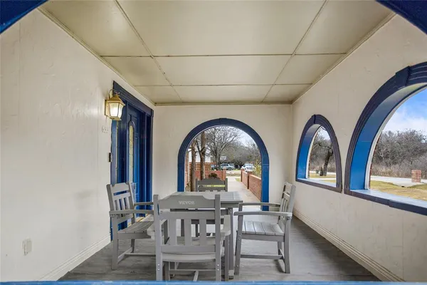 a view of a livingroom with furniture window and outdoor space