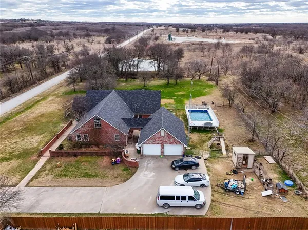 a view of house with outdoor space