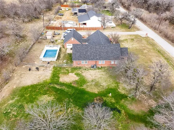 a view of house with yard