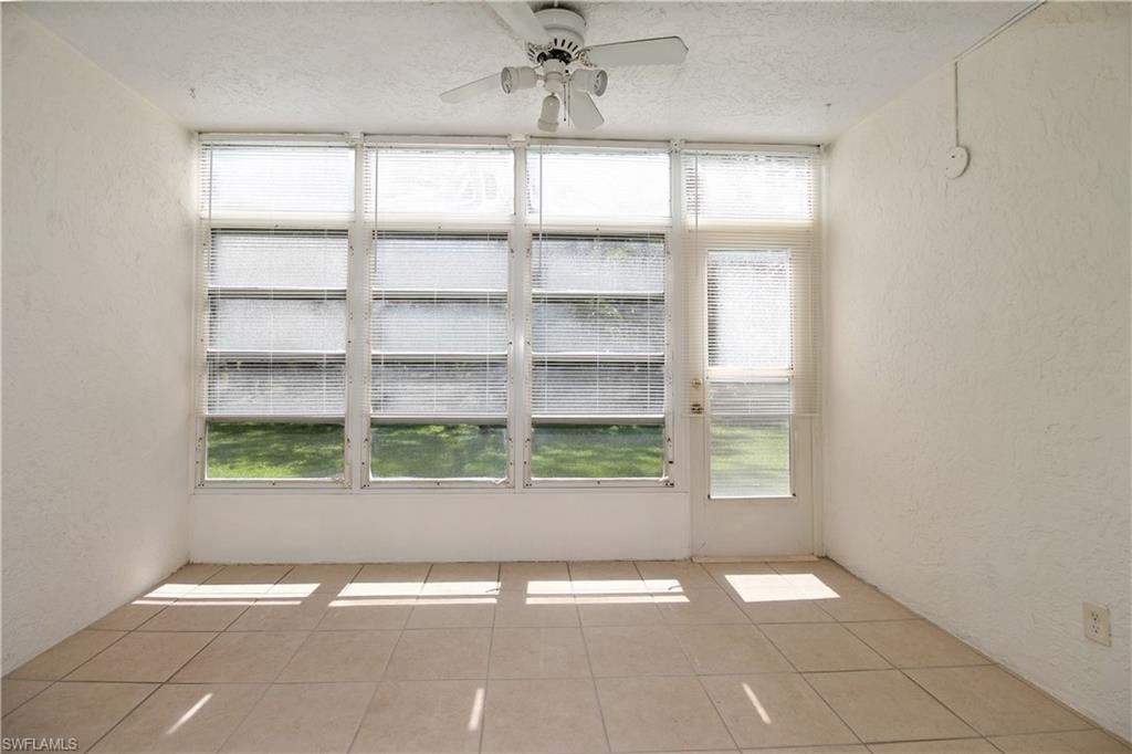 3471 County Barn Road, Unit F103 Naples, FL 34112 - Photo 4 of 27 a view of a room with window