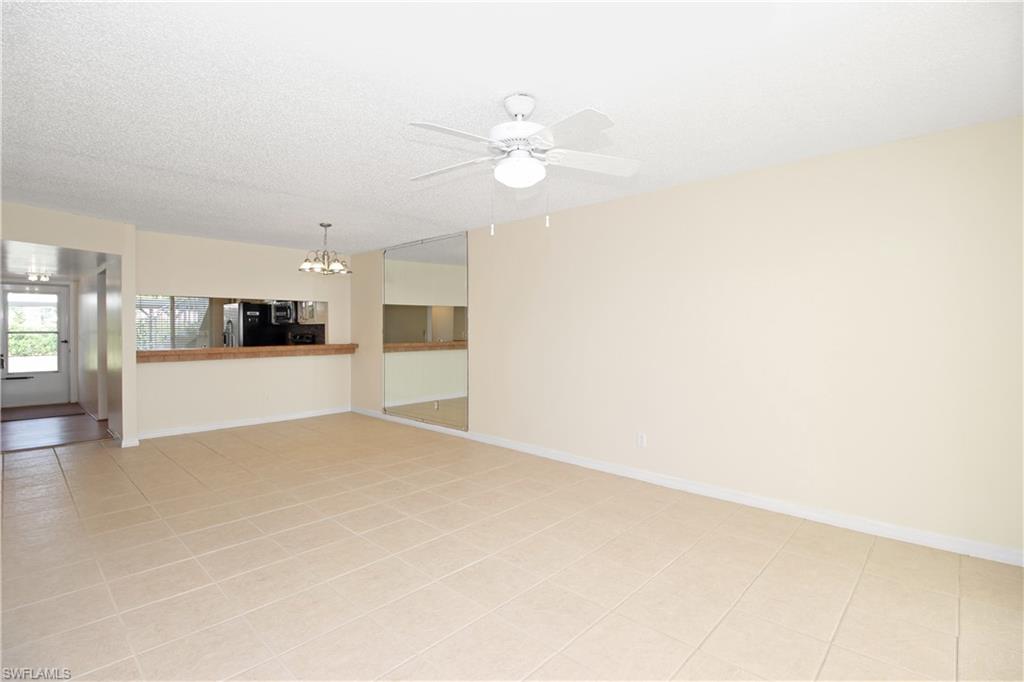 3471 County Barn Road, Unit F103 Naples, FL 34112 - Photo 6 of 27 a view of a kitchen with a sink