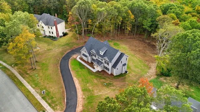 a view of a swimming pool with a yard