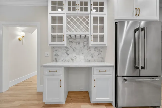 a kitchen with a sink and a window